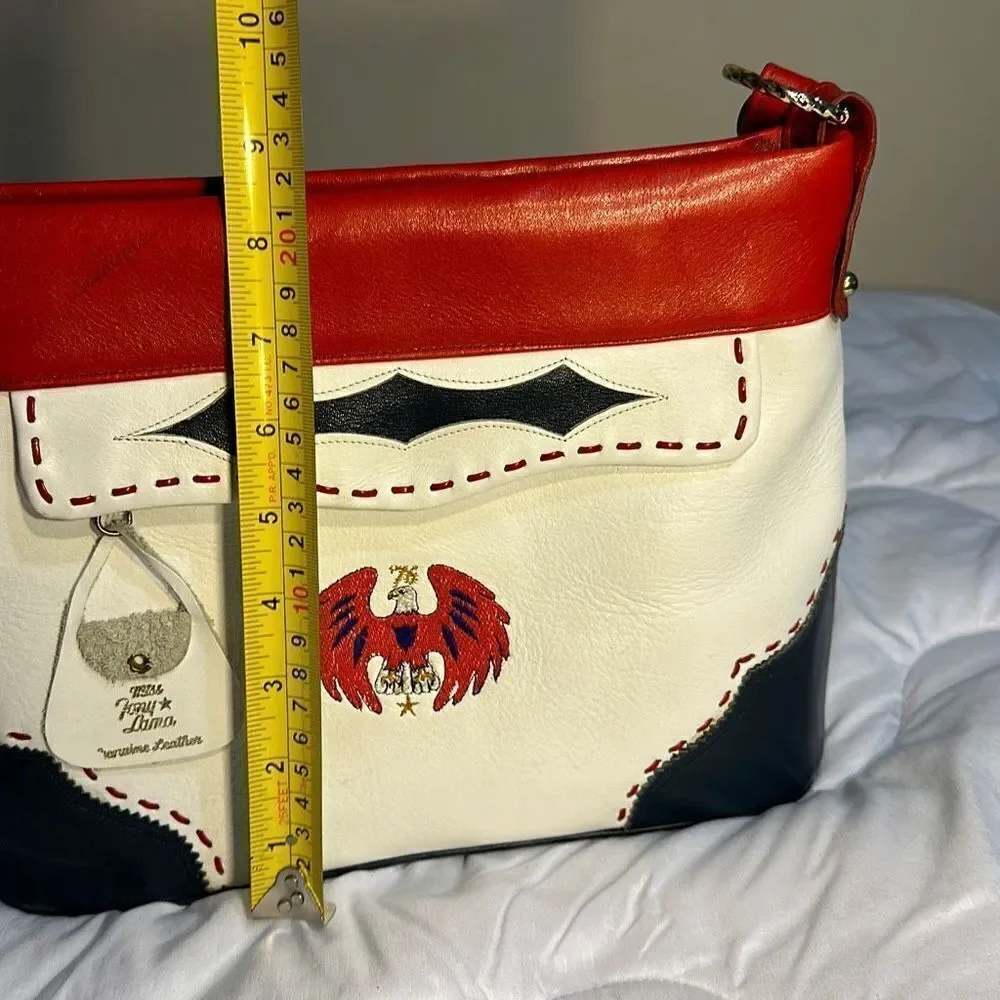 Miss Tony Lama Vintage Leather purse with strap.